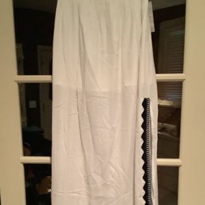 White maxi skirt with black embroidery trim  size small. Bought in Hawaii!!